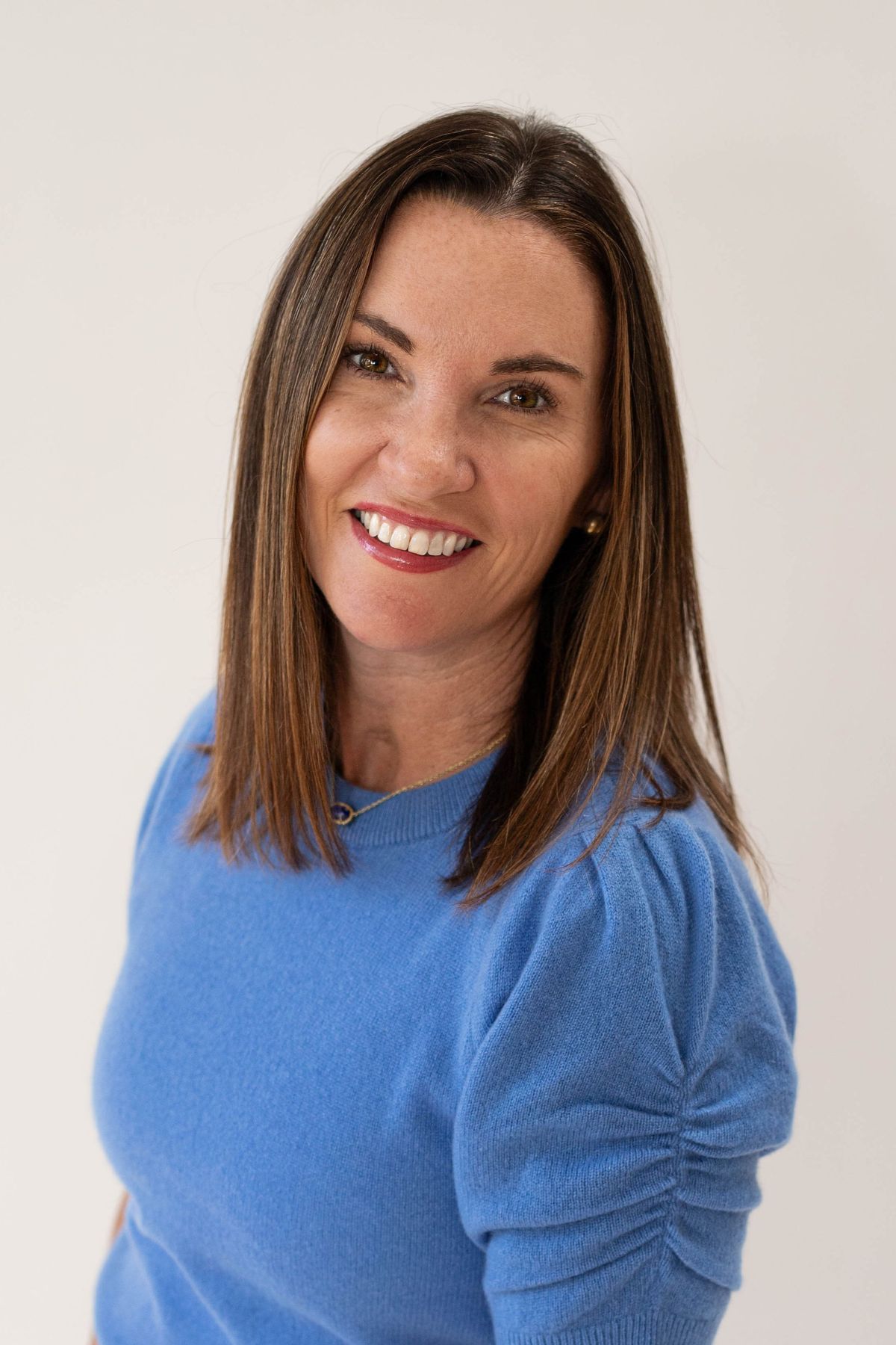 Professional headshot of Erin Scholes, Owner and President of SD Meetings, expert in corporate event strategy